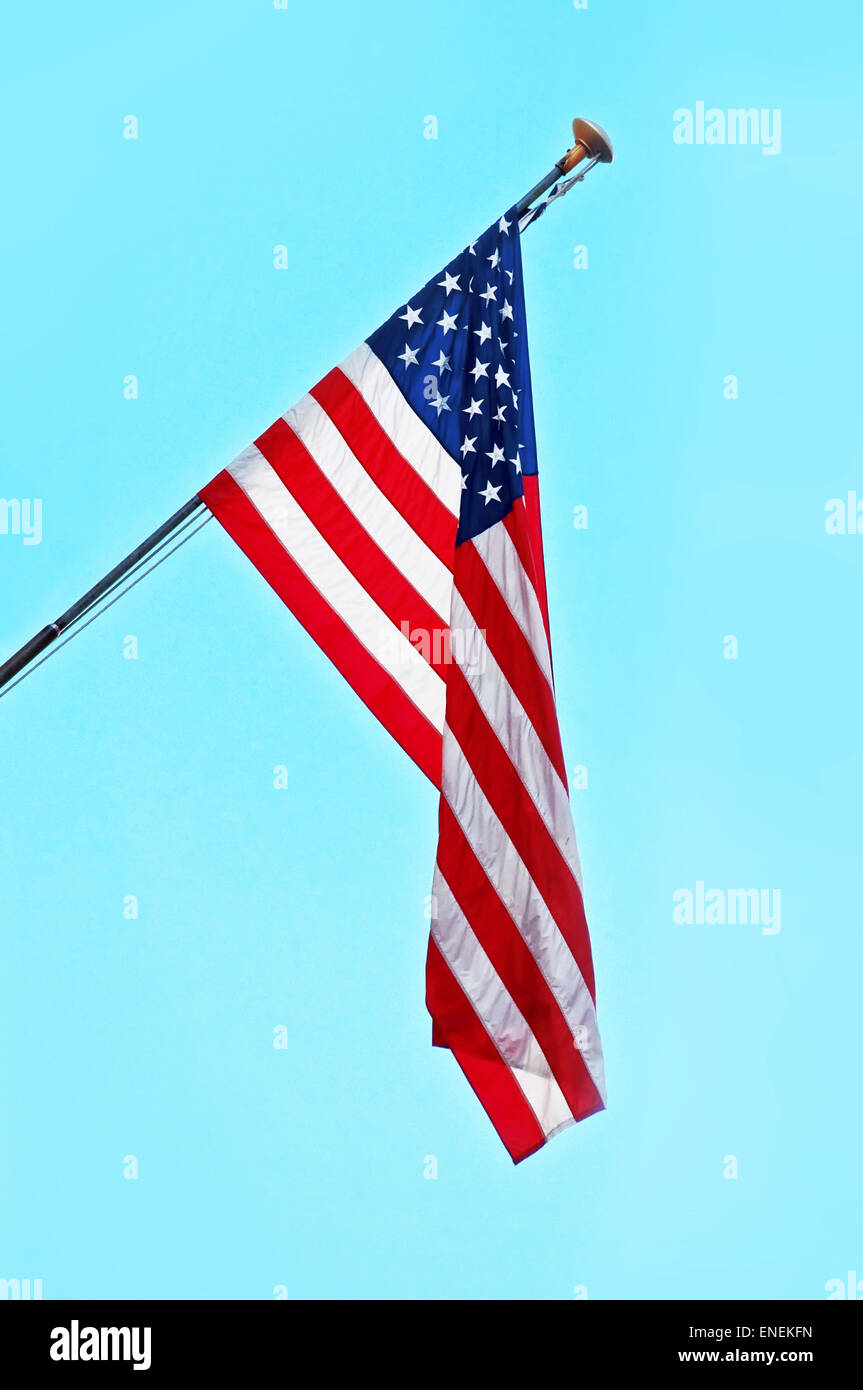USA Flag on a Post, Clear Blue Sky in Background Stock Photo - Alamy