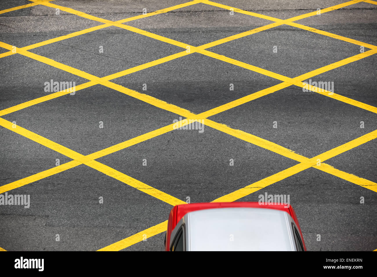 Yellow diagonals and red stripe, Lines on pavement in Penti…