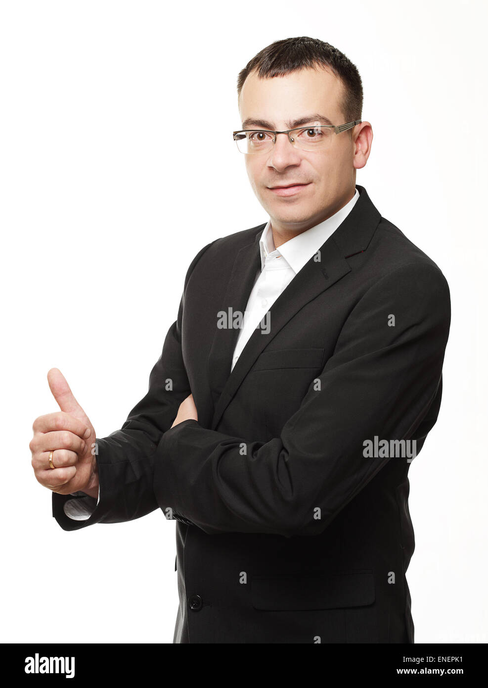 businessman showing thumbs up in office Stock Photo