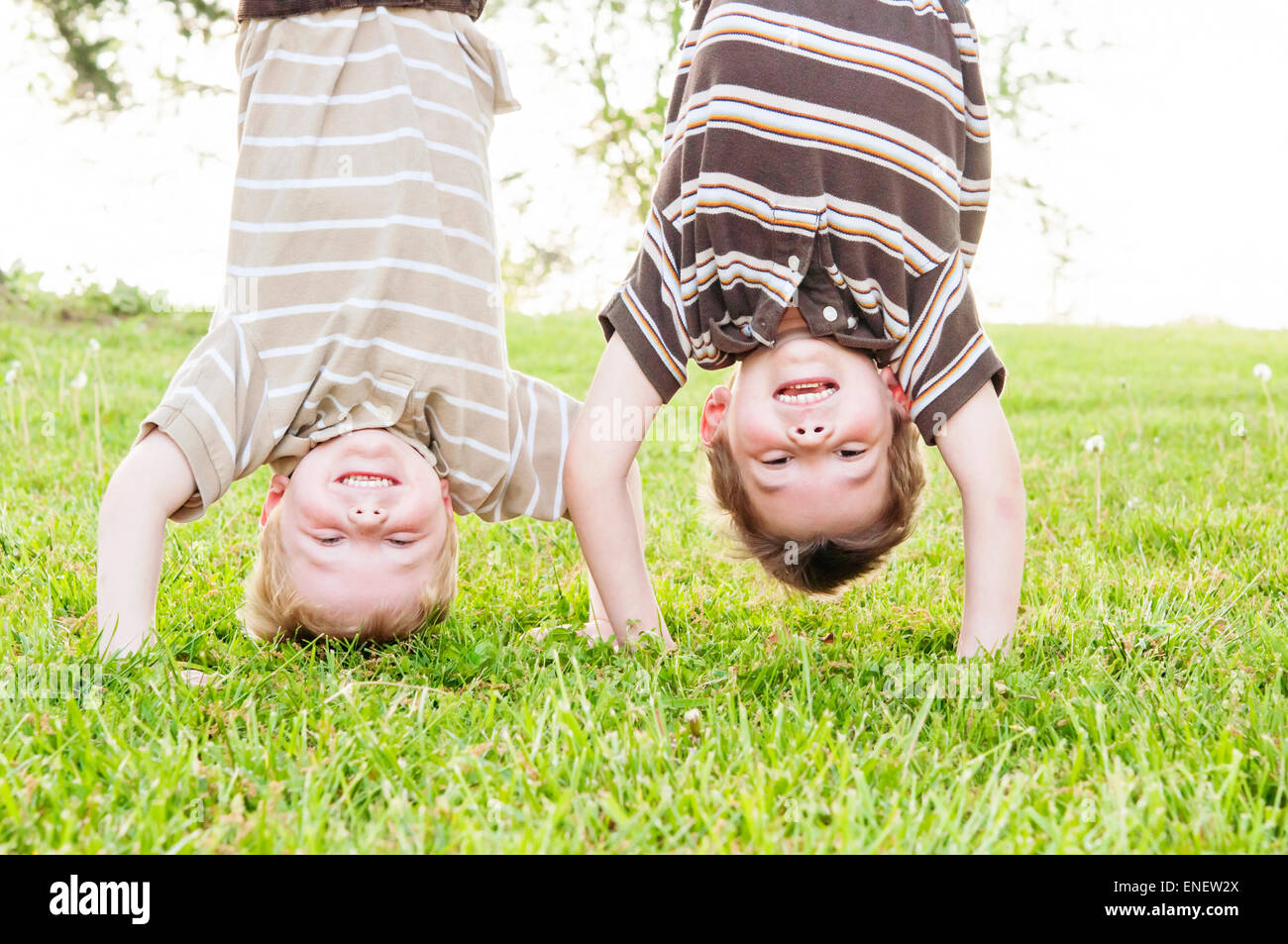 two boys upside down Stock Photo