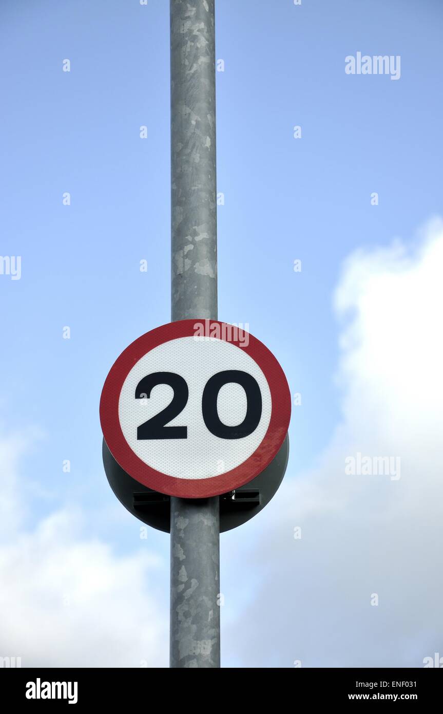 20 mph  speed limit sign affixed to metal pole Stock Photo