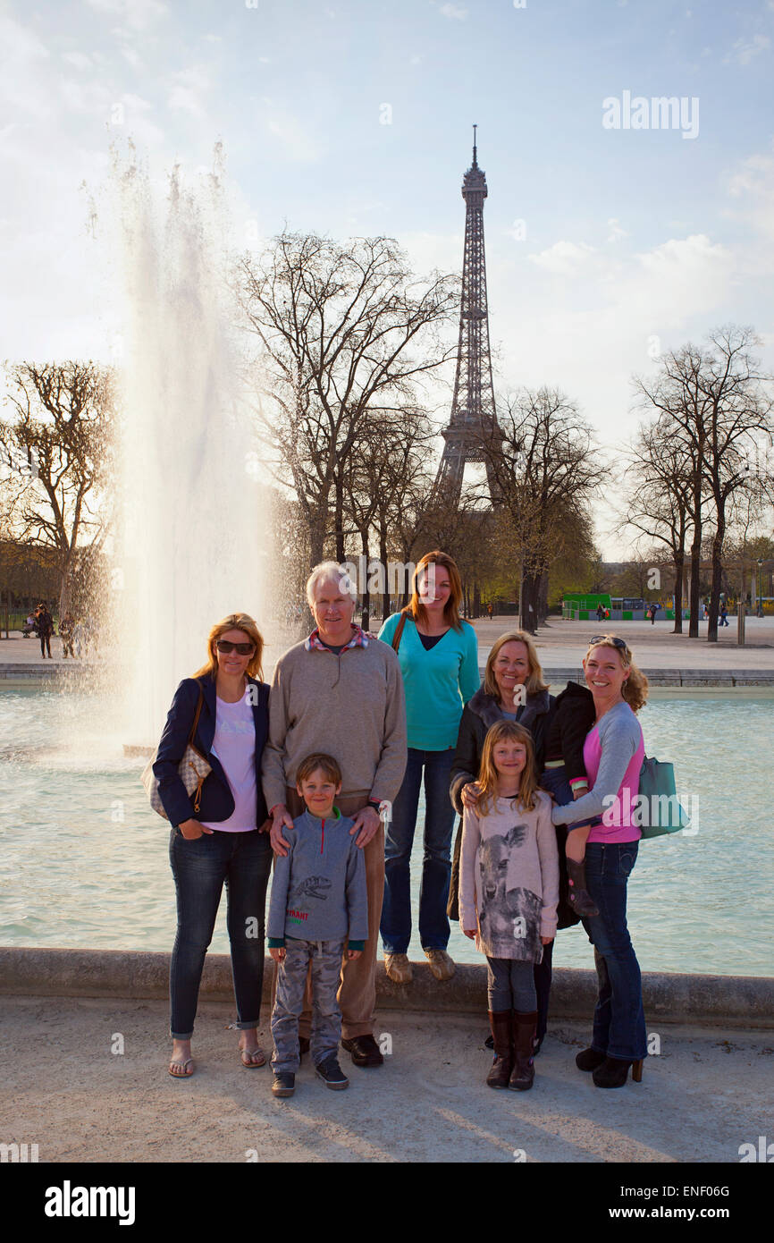 Large family in front of the Eiffel Tower, Paris France Stock Photo