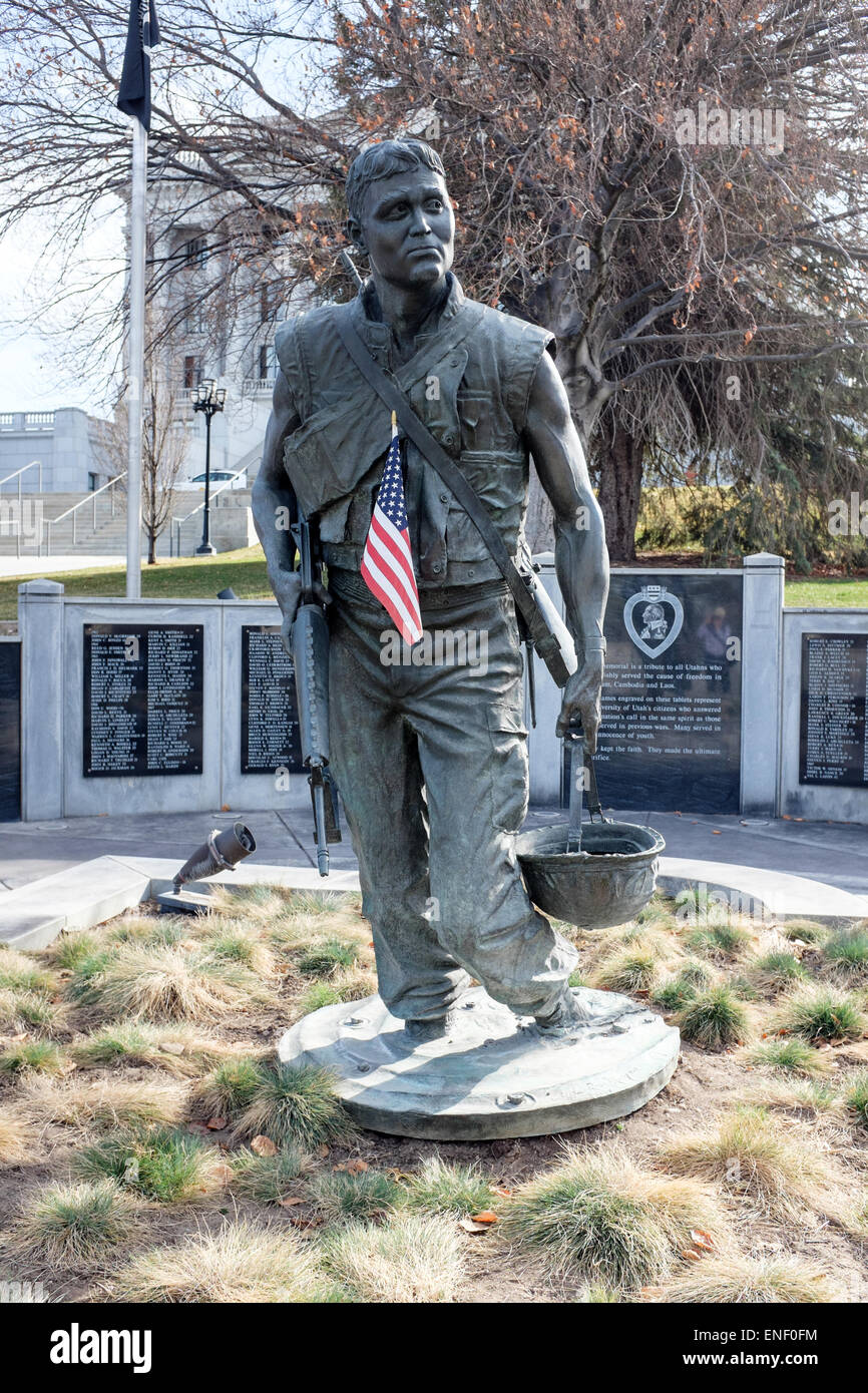 Bronze statue of Utah soldier by Mark Davenport surrounded by Clyde Ross Morgan's circular wall Stock Photo