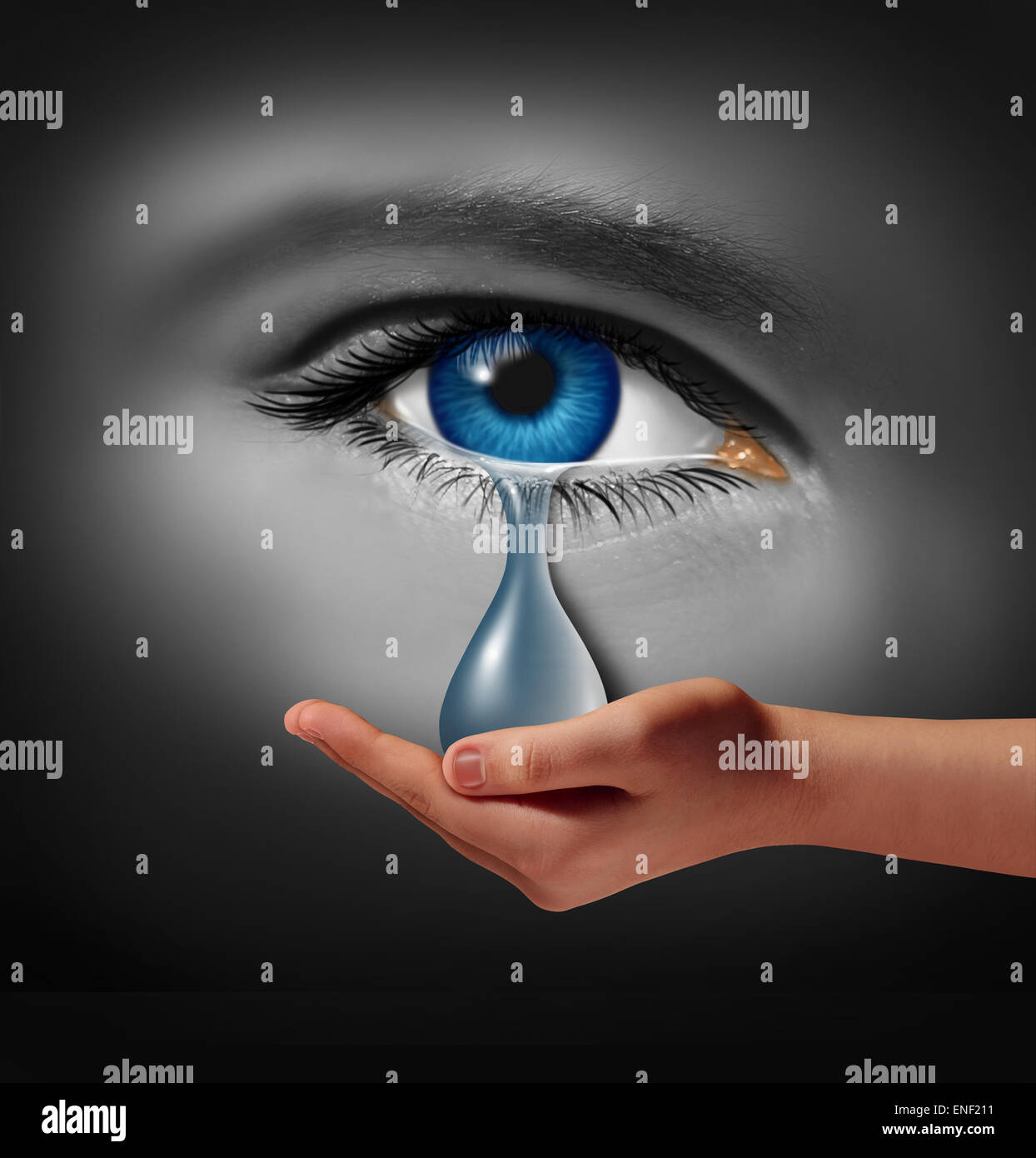 Depression support and therapy concept as a depressed human eye crying a tear held by a helping hand as a metaphor for solutions in the the treatment of mental health issues through psychotherapy or medication. Stock Photo