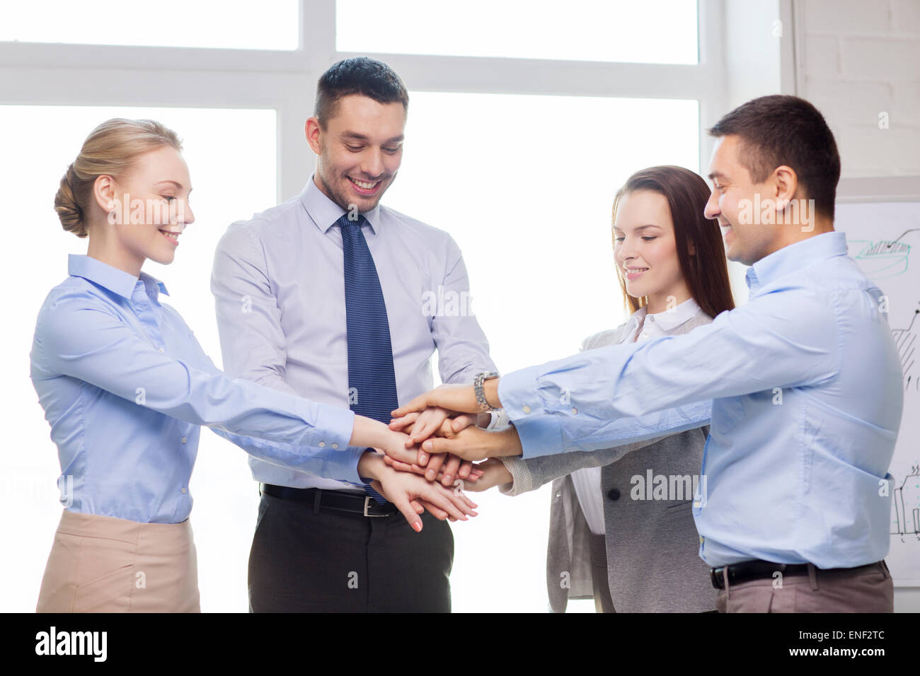 business team celebrating victory in office Stock Photo - Alamy