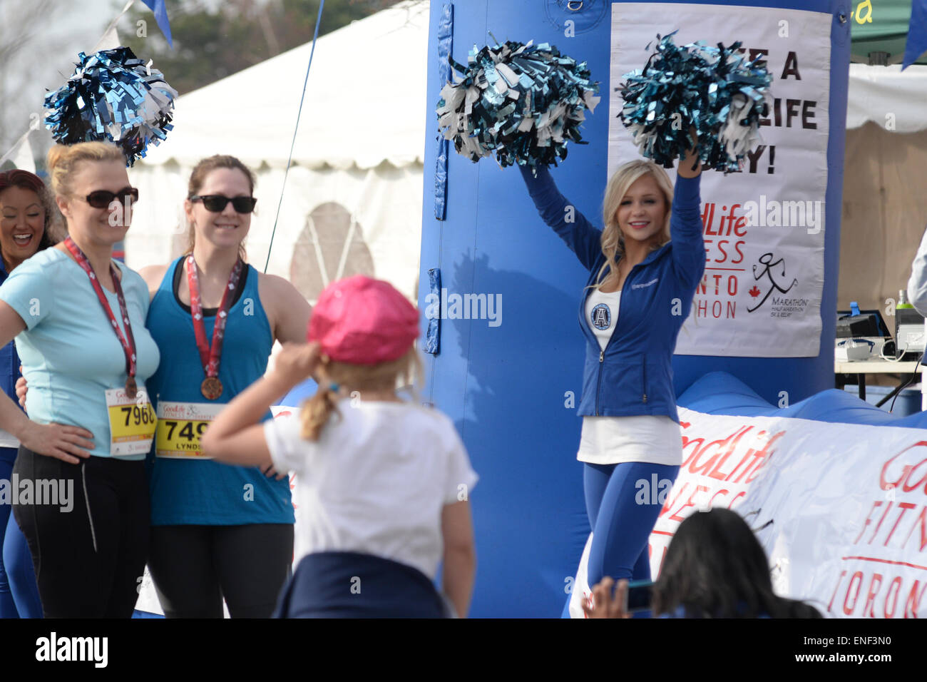 Toronto, Canada. 3rd May, 2015. Cheer leader the runners at