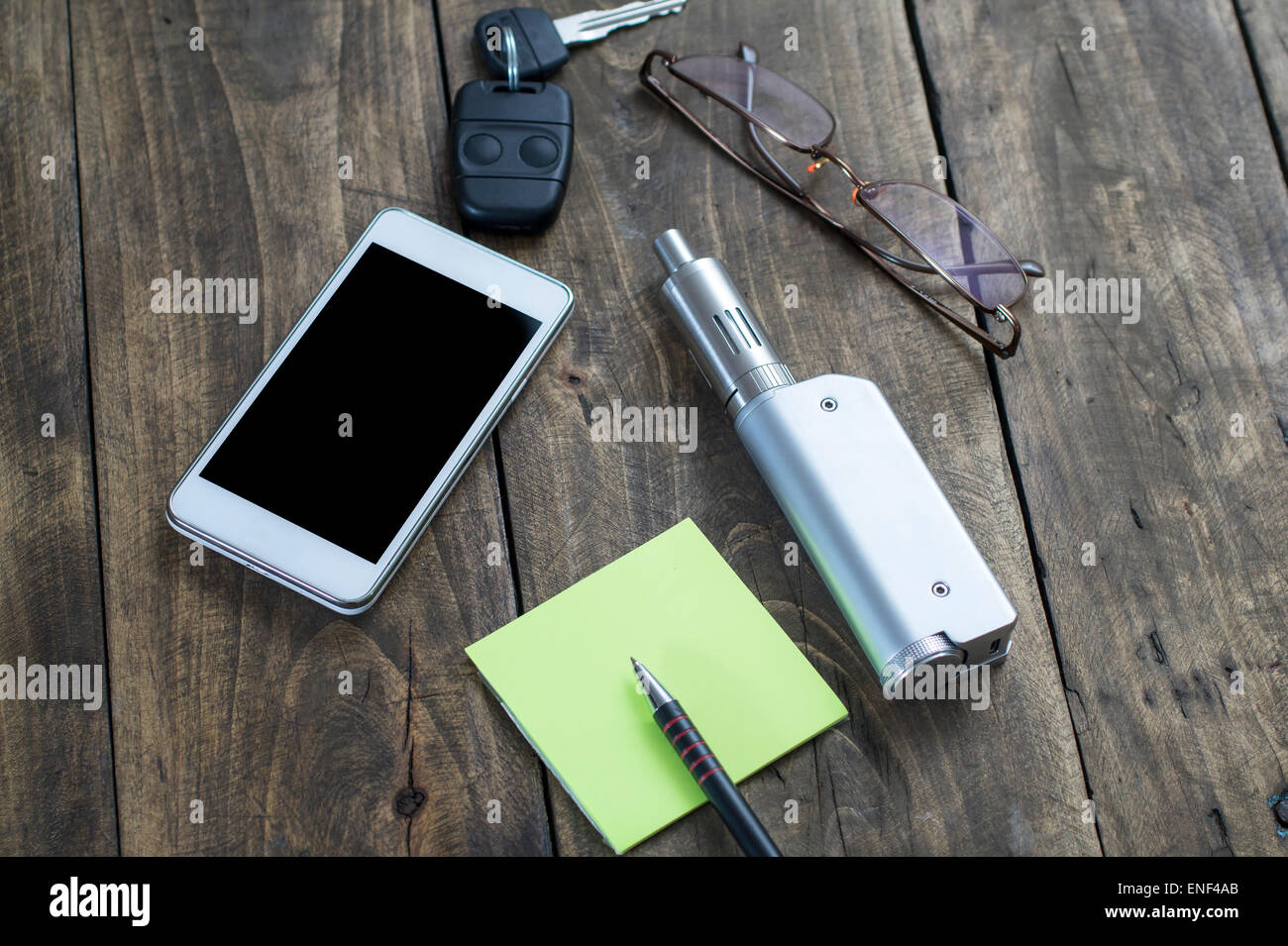 Men's Accessories , top view on a wooden background, contains the phone ...