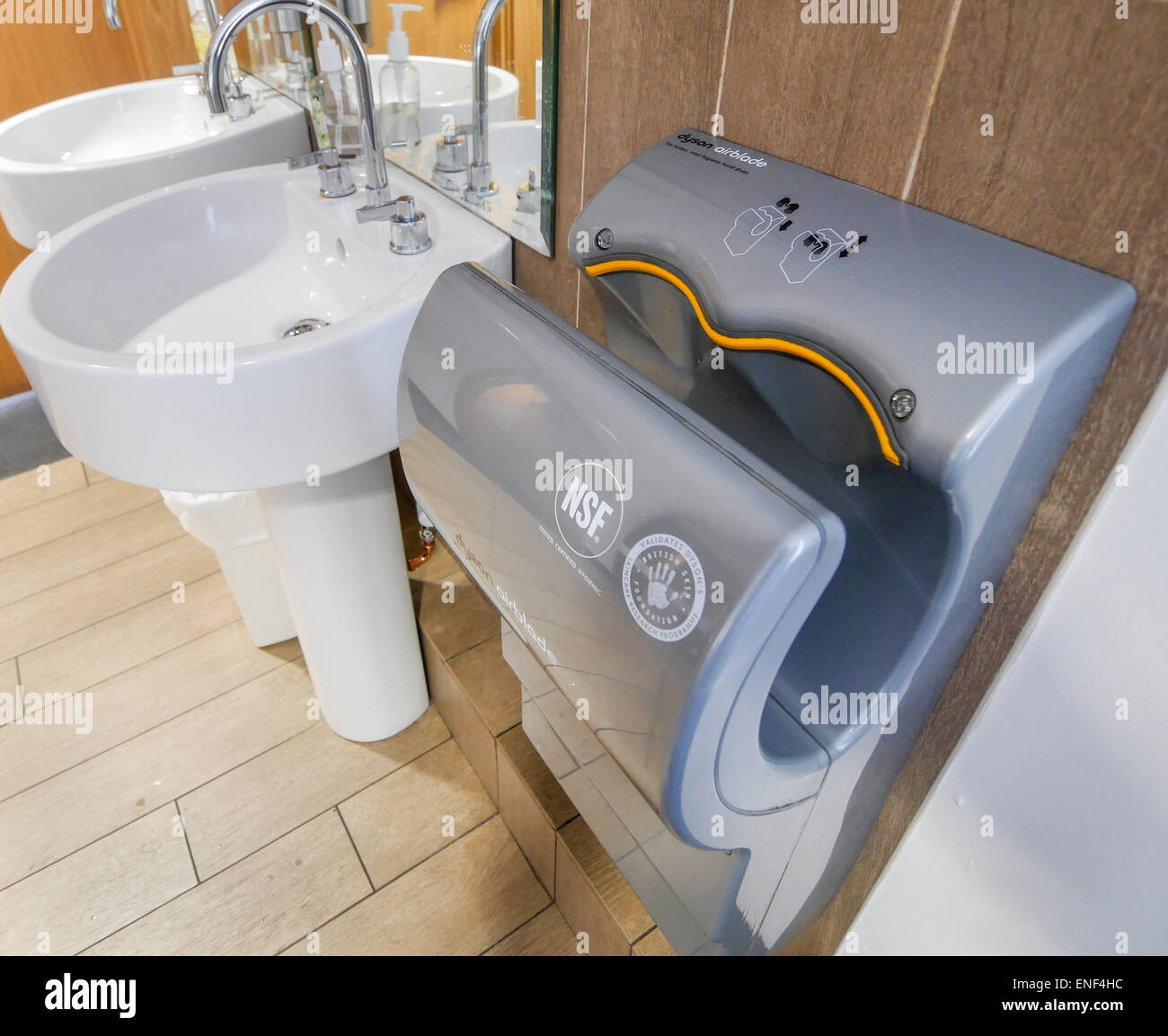 Dyson airblade hand drier in a public toilet Stock Photo Alamy