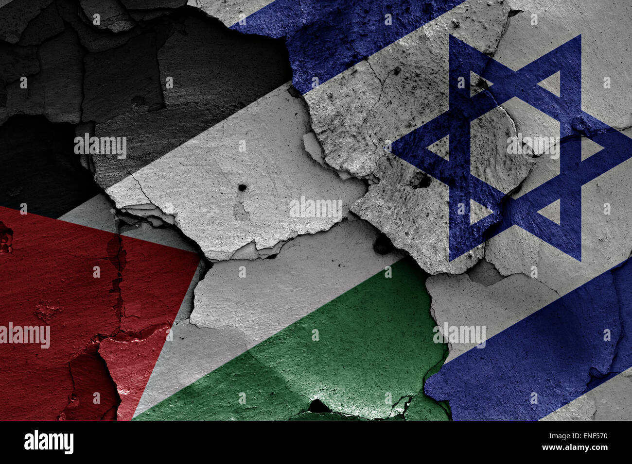 flags of Palestine  and Israel painted on cracked wall Stock Photo