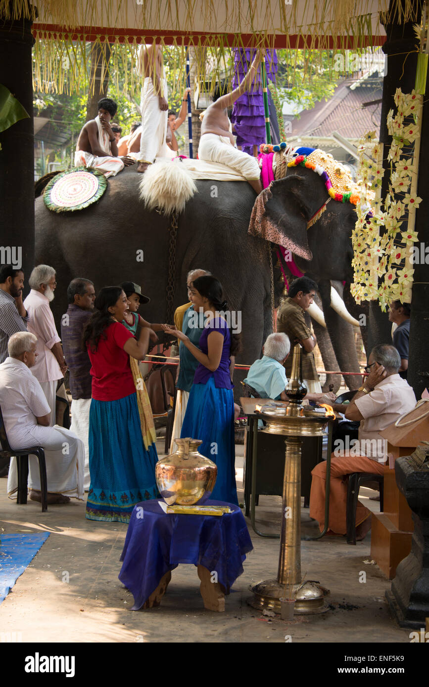 A Hindu ceremony (Pooram) complete with caparisoned elephants and drumming (Madhalam) and horns (Kombu) was held at a non-publicized event near the Stock Photo