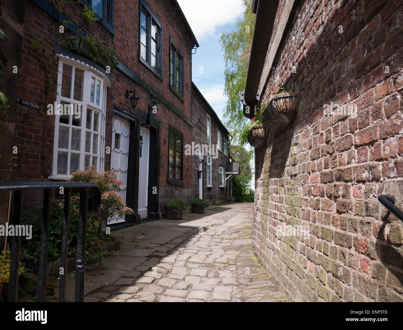 Cobbled village street, Lymm, Cheshire, UK Stock Photo