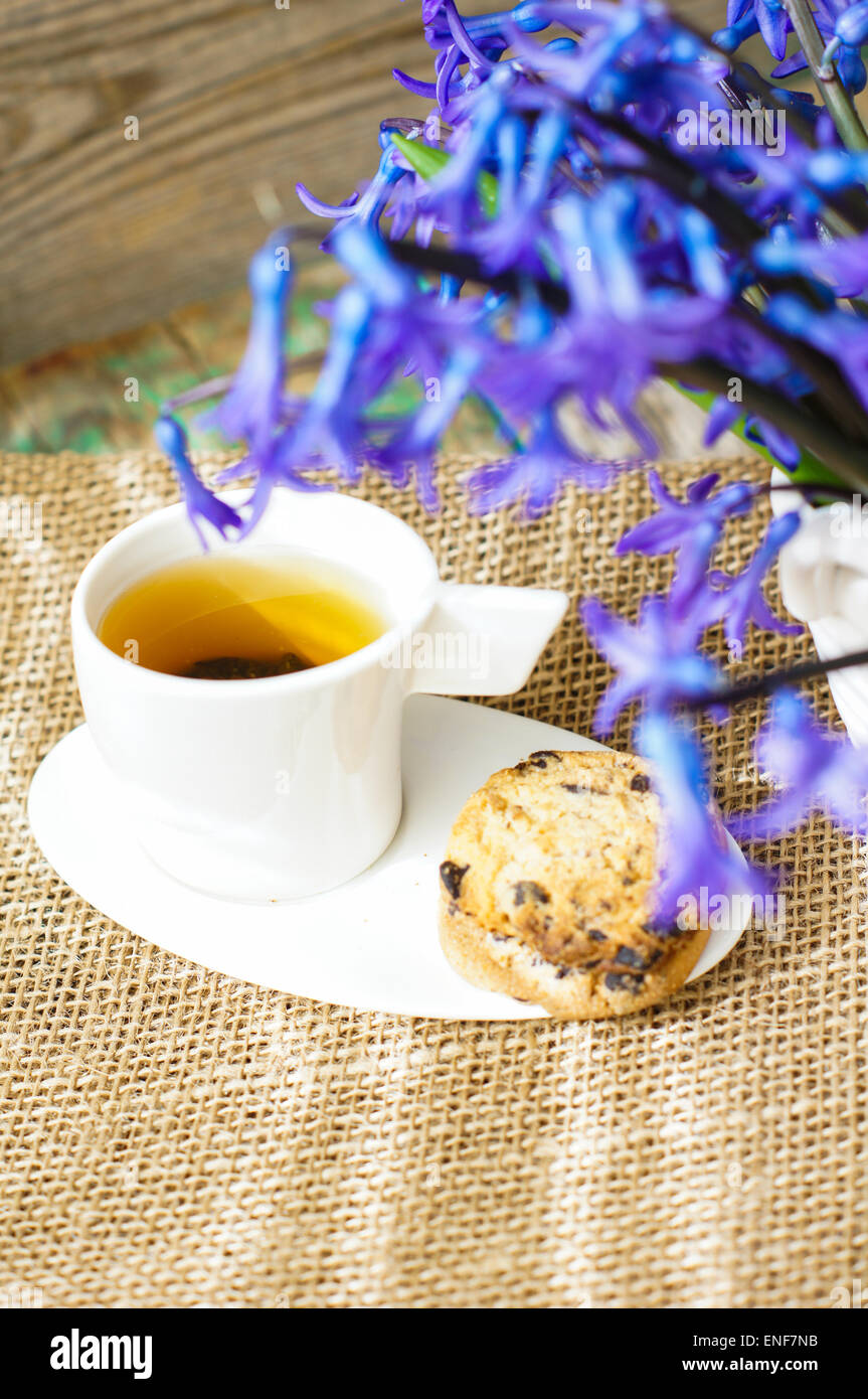 Cup of fresh herbal tea with mint on wooden table Stock Photo - Alamy