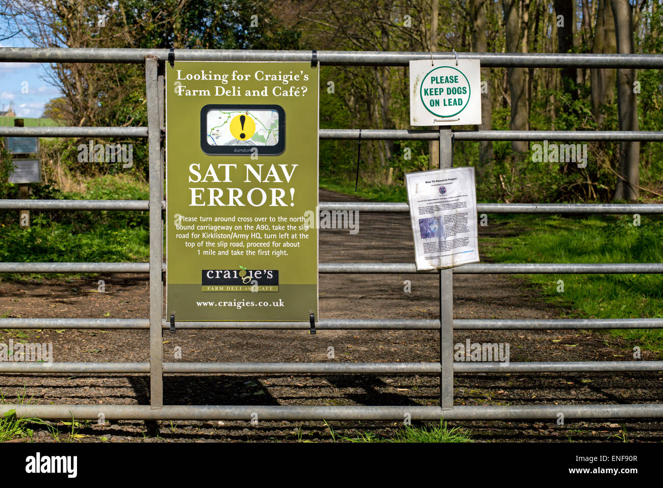 Sign on a gate out in the countryside near Edinburgh highlighting a Sat Nav error. Stock Photo
