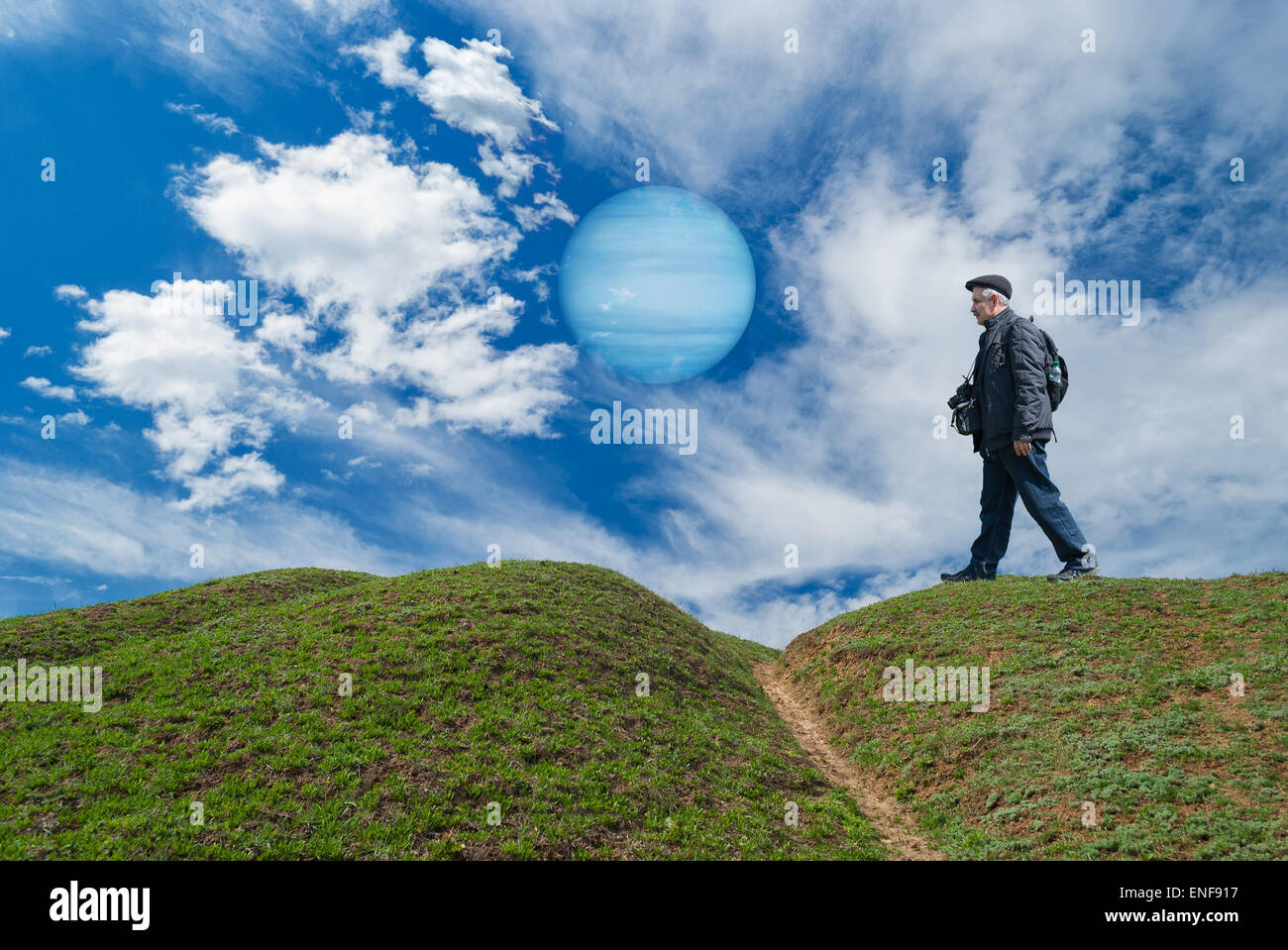 Brave tourist on a desolate planet walking in search of interesting photo locations. Stock Photo