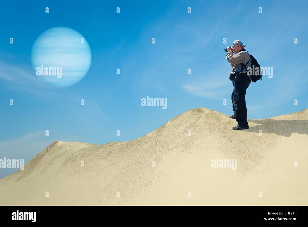 Brave tourist on a desolate planet taking photograph of its satellite Stock Photo
