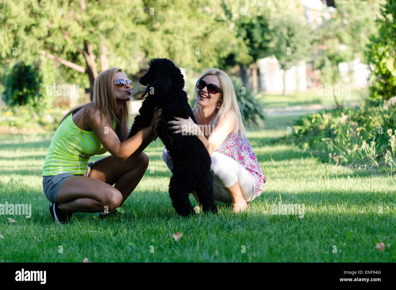 Two french women walking dog hi-res stock photography and images - Alamy