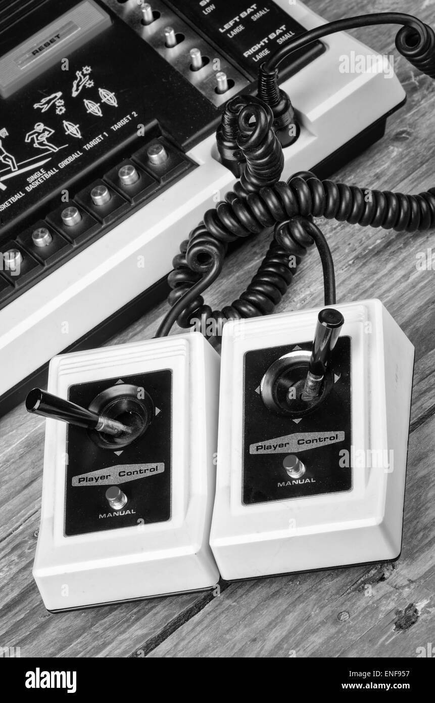 Old game console with very simple wired joysticks Stock Photo - Alamy