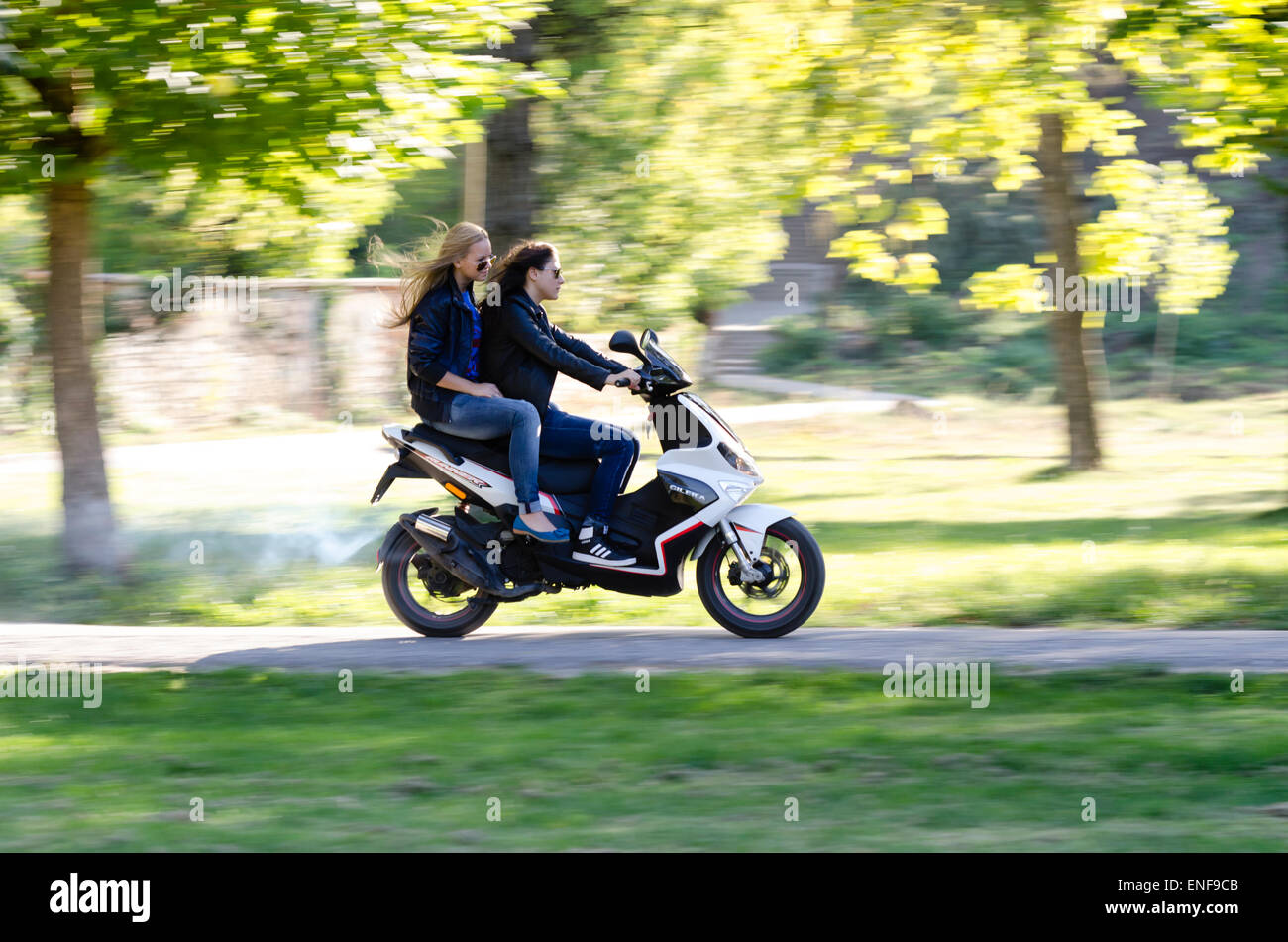 Girls Driving Scooter Stock Photos Girls Driving Scooter Stock