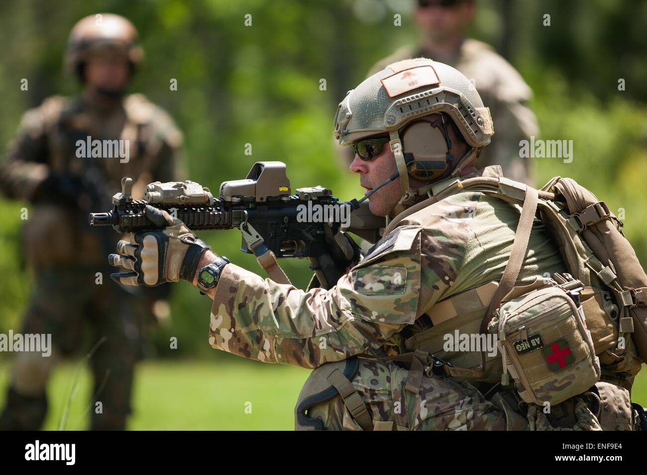 US Special Forces soldier with the Army National Guard demonstrate operational techniques to Chile Special Operation commandos at the Camp Shelby Joint Forces Training Center April 23, 2015 in Hattiesburg, Mississippi. Stock Photo