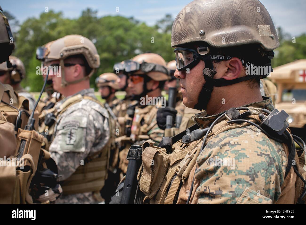 Chile Special Operation commandos and US Special Forces soldiers receive a briefing at the Camp Shelby Joint Forces Training Center April 23, 2015 in Hattiesburg, Mississippi. Stock Photo