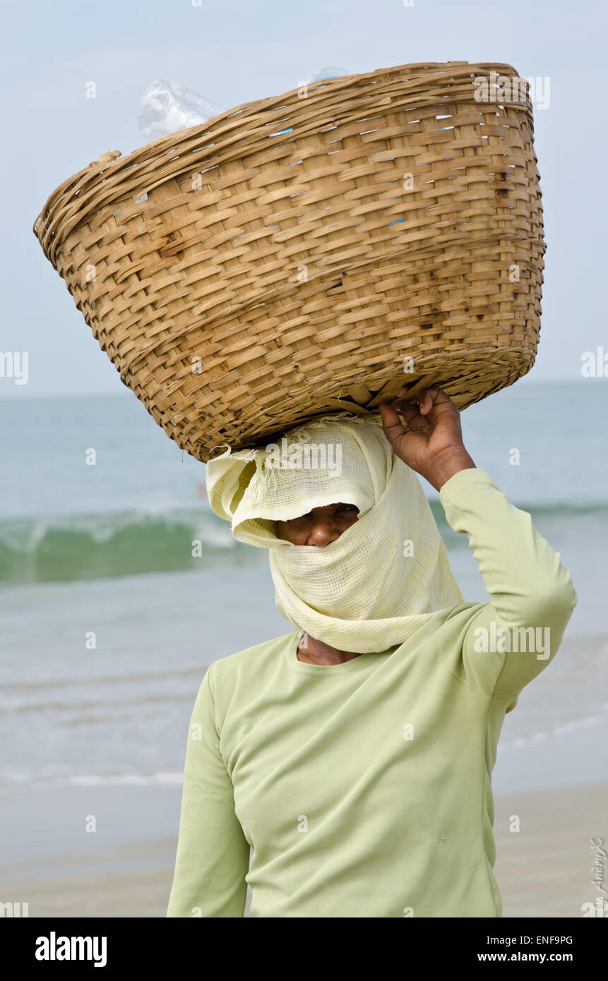 Indian woman with basket Stock Photo