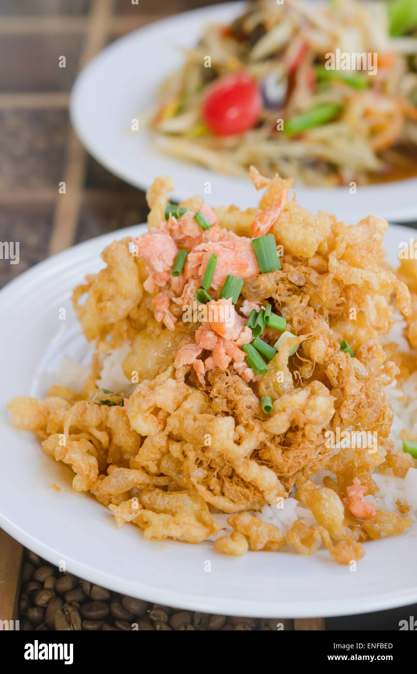 fried crispy beaten egg omelette served with steamed rice Stock Photo
