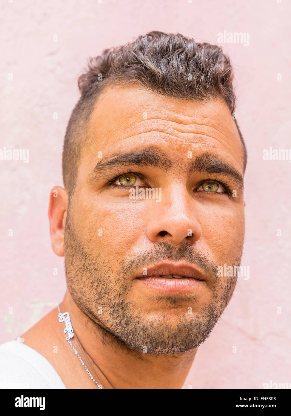 a close-up of the face of a 20-29 year old hispanic cuban
