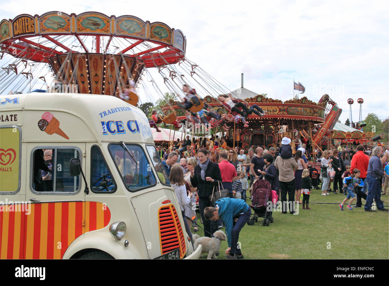 Morris Commercial J-Type Ice Cream Van, KFL 954, Carter's Steam Fair. Traditional historic travelling fairground rides and attractions. May Day Bank Holiday 2015. Hersham Green, Surrey, England, Great Britain, United Kingdom, UK, Europe Credit:  Ian Bottle / Alamy Live News Stock Photo