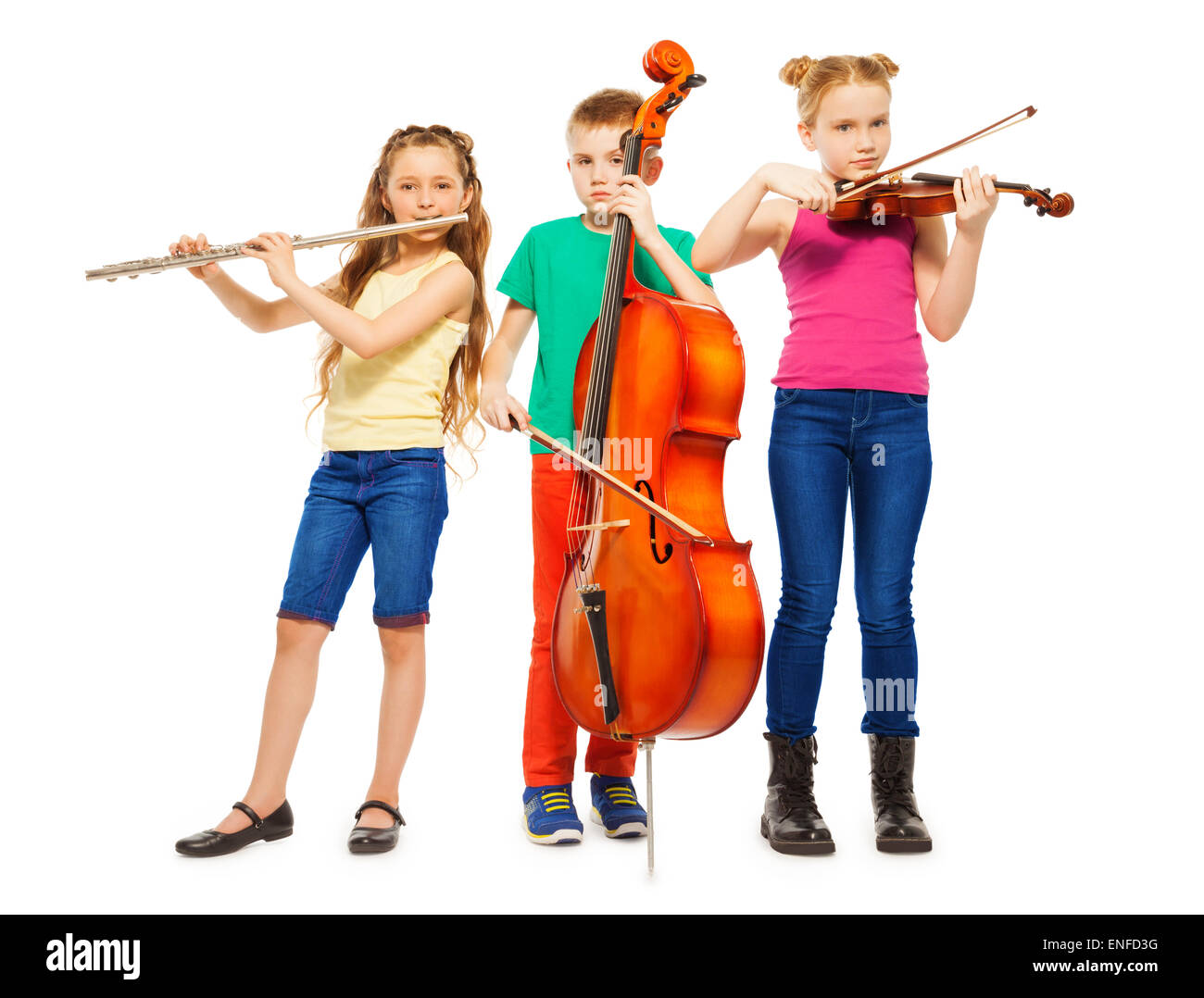 Children playing on musical instruments together Stock Photo