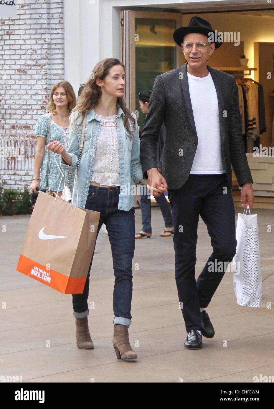 Jeff Goldblum takes his girlfriend Emilie Livingston shopping at The Grove in Hollywood  Featuring: Jeff Goldblum,Emilie Livingston Where: Los Angeles, California, United States When: 30 Oct 2014 Stock Photo