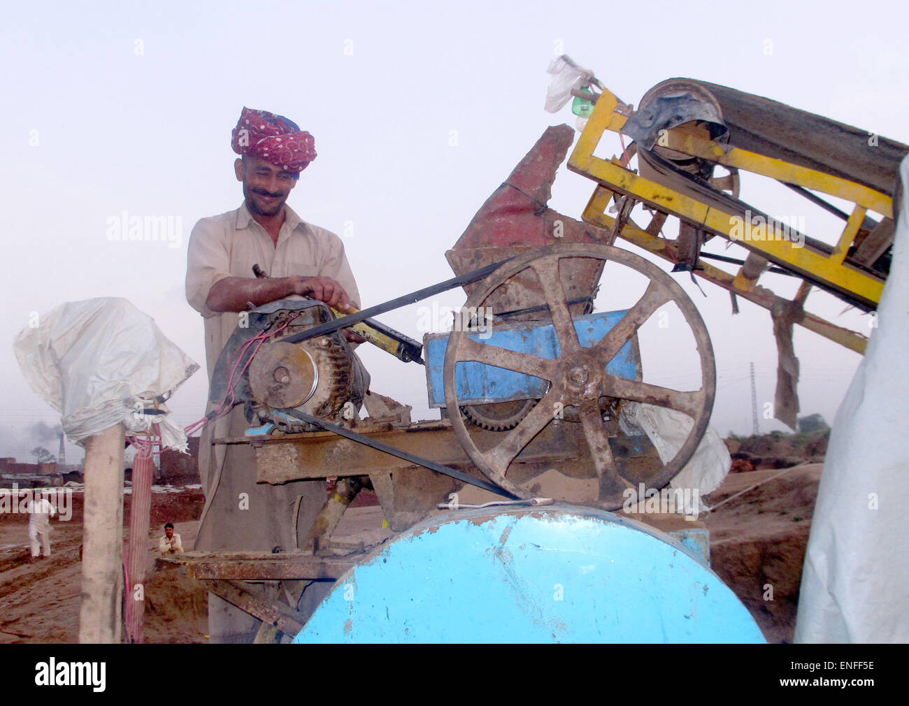 Islambad, Pakistan. 27th Apr, 2015. Pakistani Mohamed Israr works on a ...