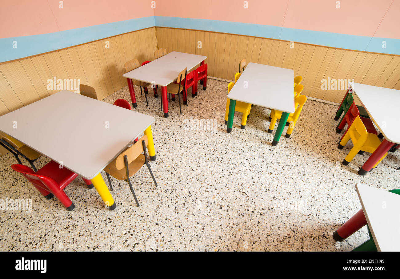 chairs and tables in the canteen of a refectory of kindergarten Stock Photo