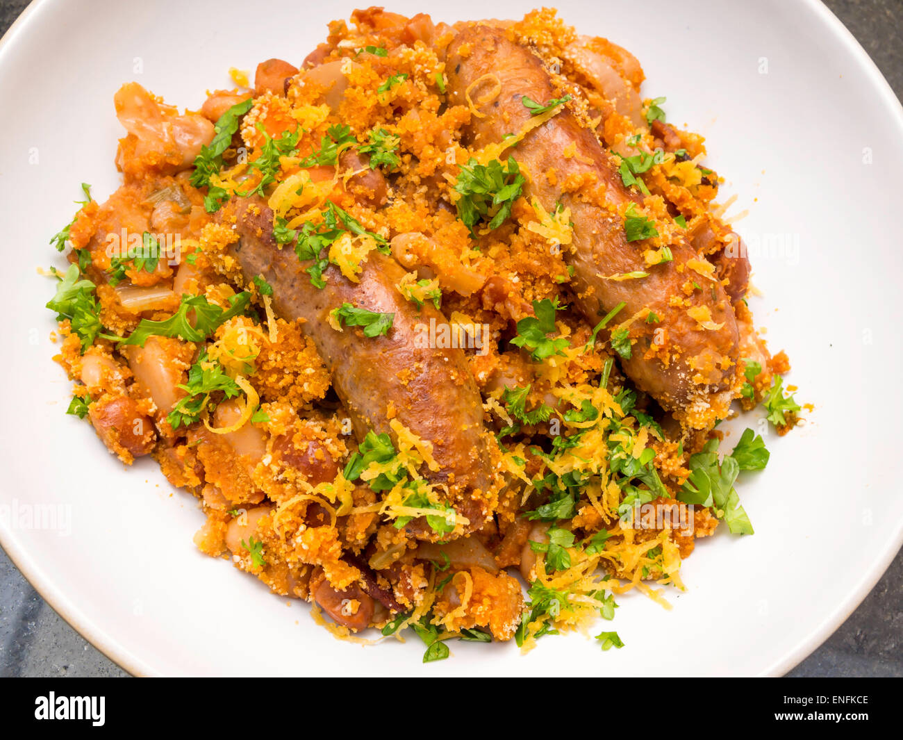 Bowl of Frenchstyle Cassoulet made with sausages beans and bacon with