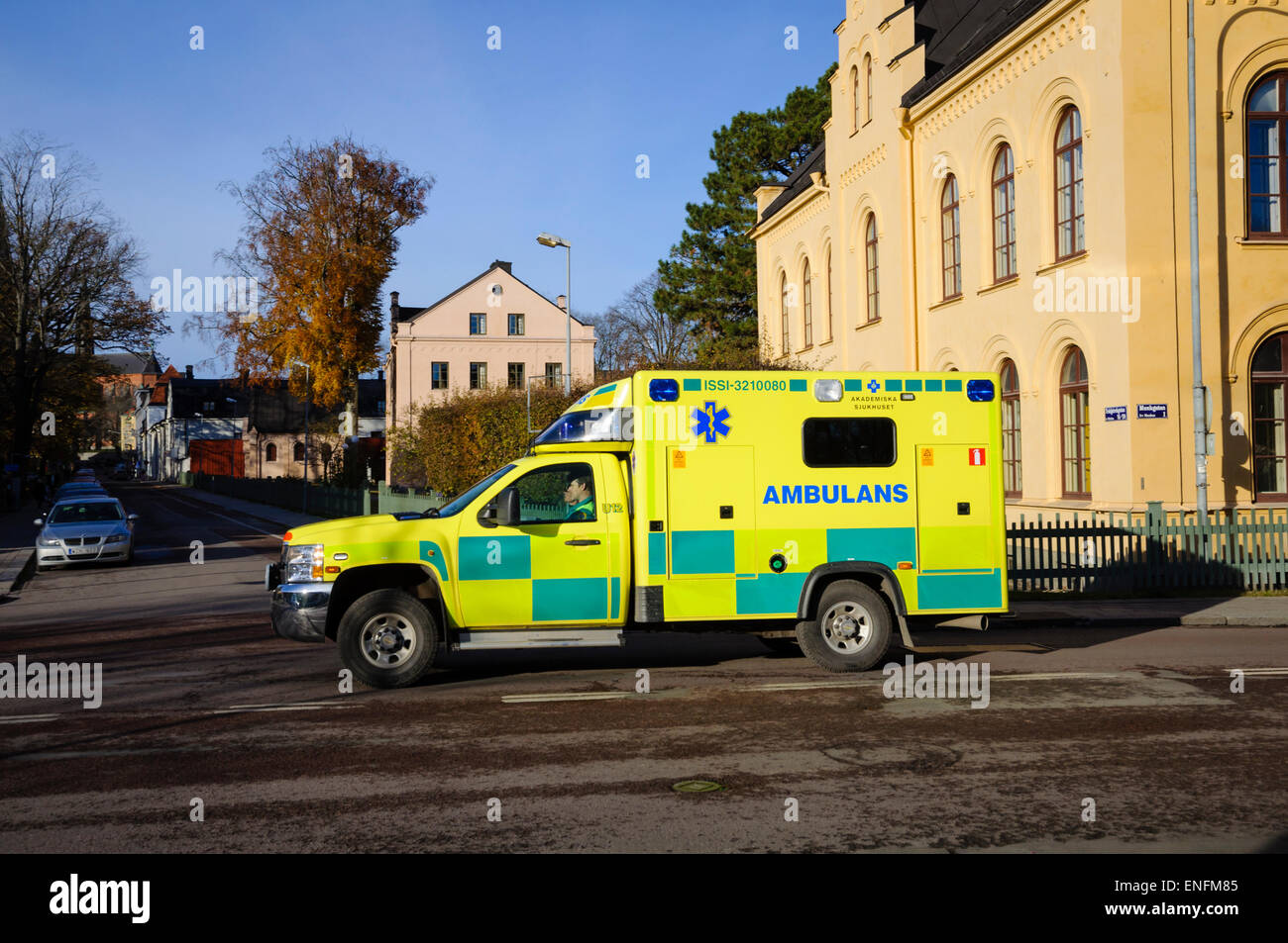 Ambulance speeding towards where it is needed. Stock Photo