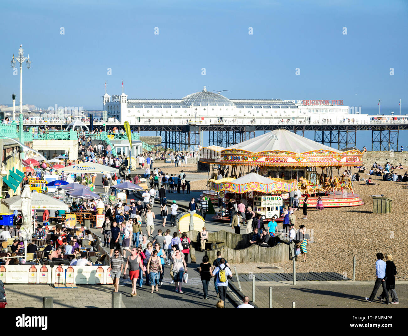 Spring crowds gathering to enjoy the unseasonably hot weather: Brighton Beach, East Sussex, England Stock Photo