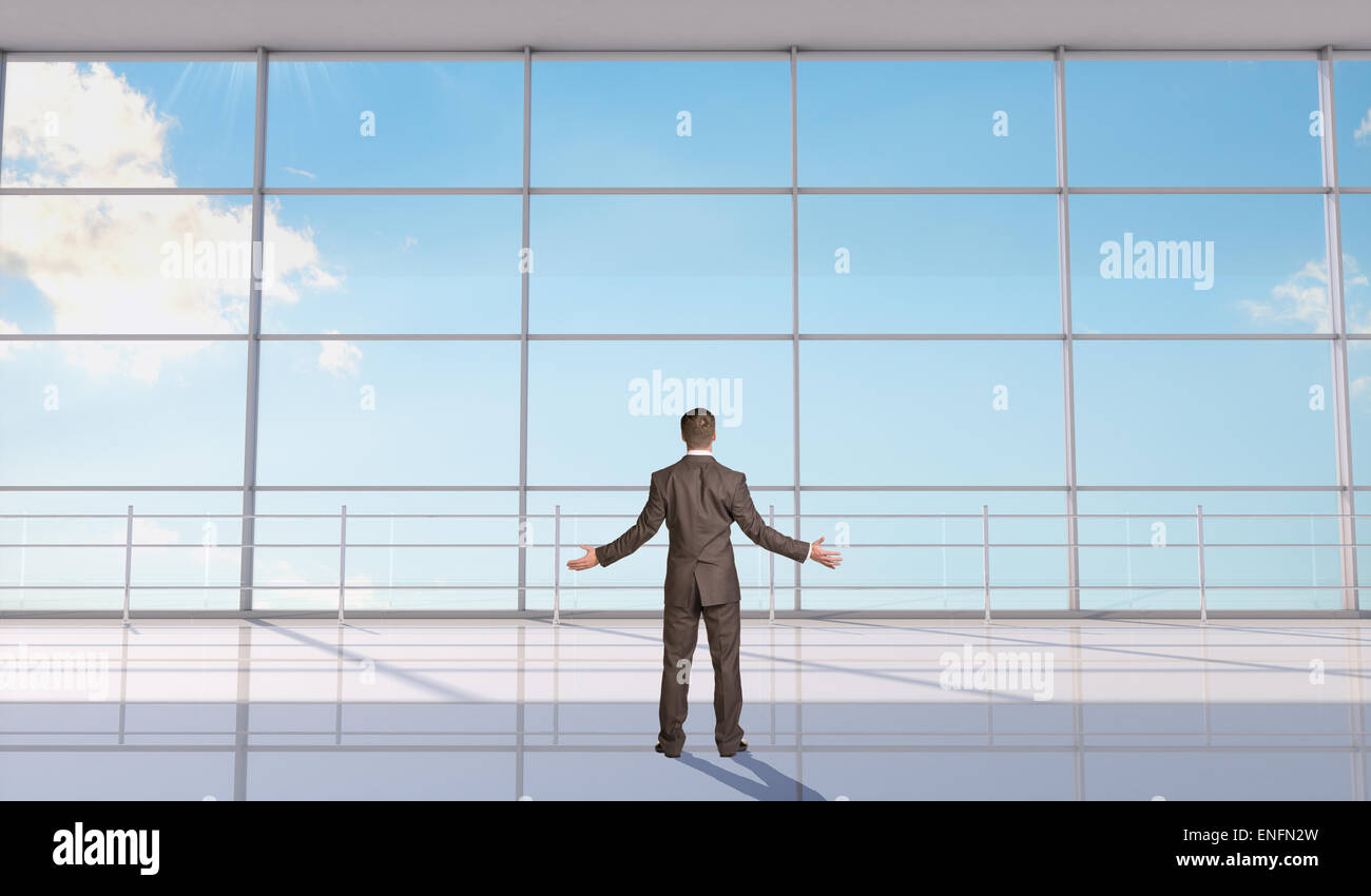 Businessman throwing up his hands Stock Photo Alamy