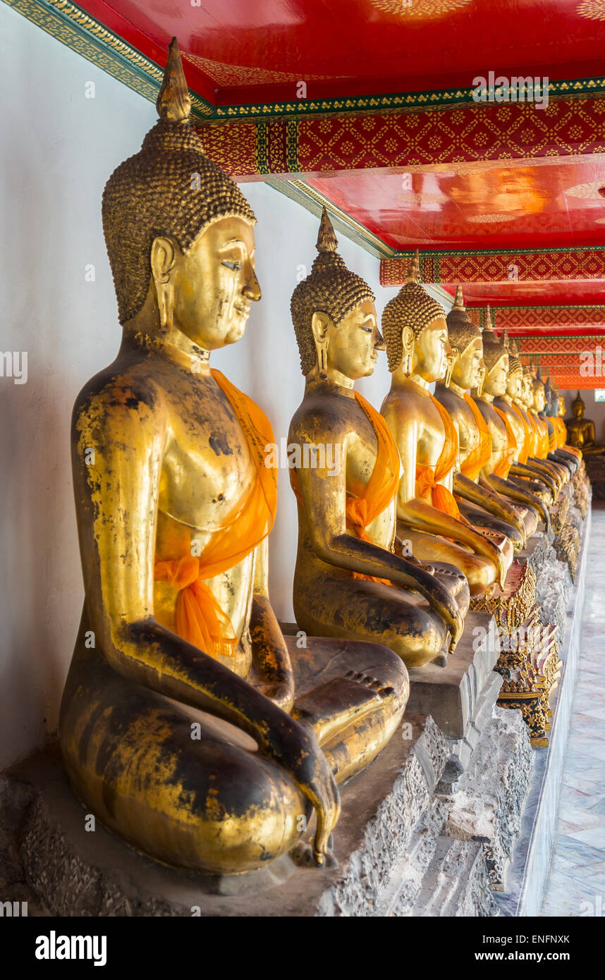 Golden statues of Buddha in Wat Po temple, Bangkok, Thailand Stock ...