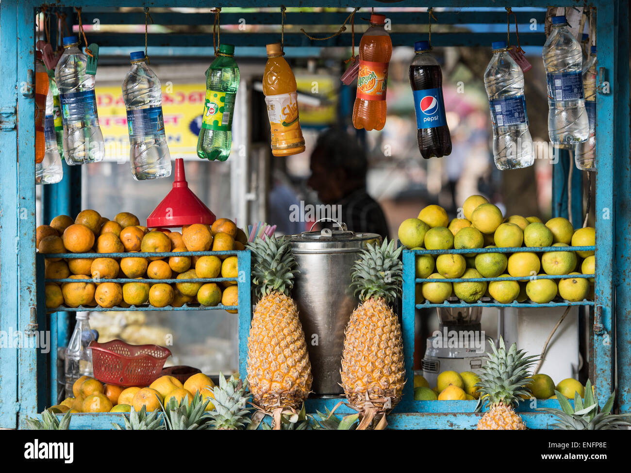 Drinks and fruit for sale at a stand, Kochi, Cochin, Kerala, India Stock Photo