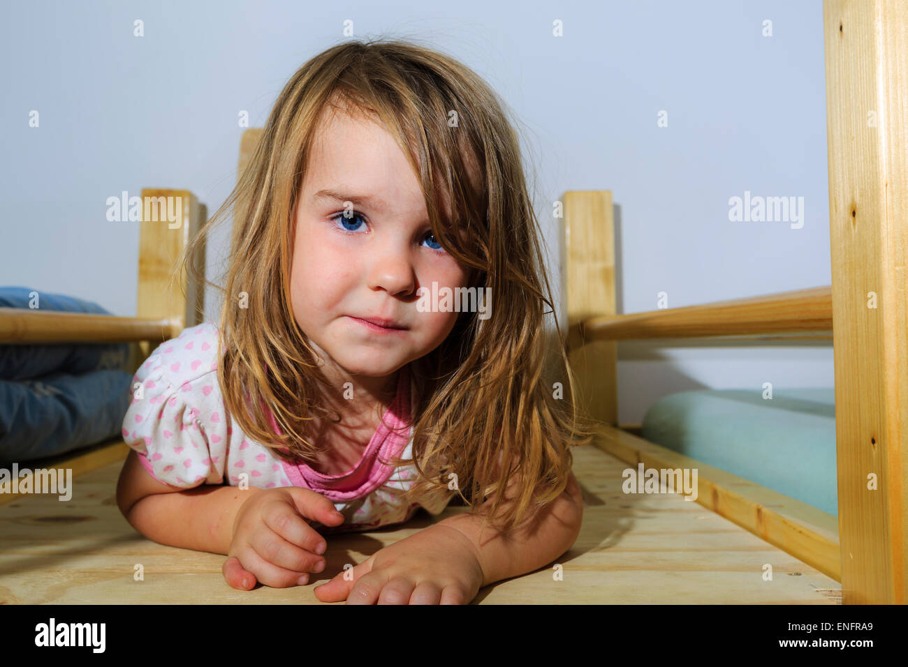 Girl, 3 years, in the kid's room Stock Photo