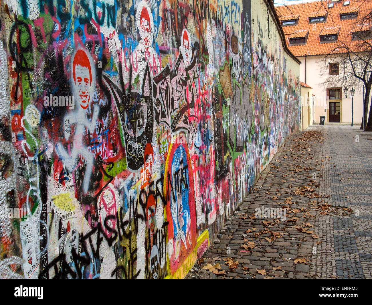 Wall of graffiti, cobbled streets of Prague Stock Photo Alamy