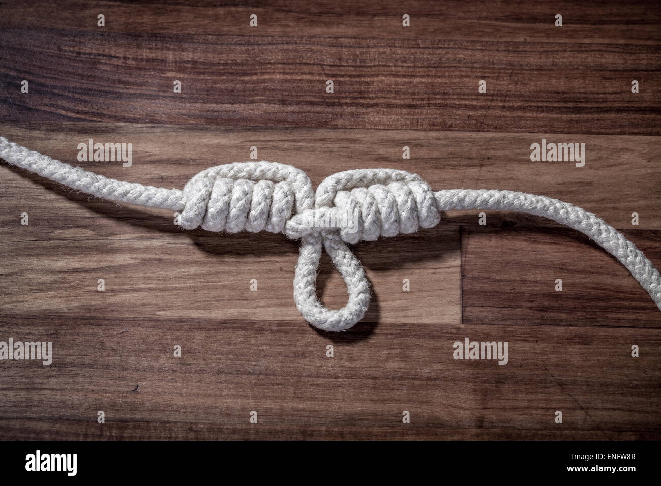 Dropper Loop knot with white rope Stock Photo - Alamy