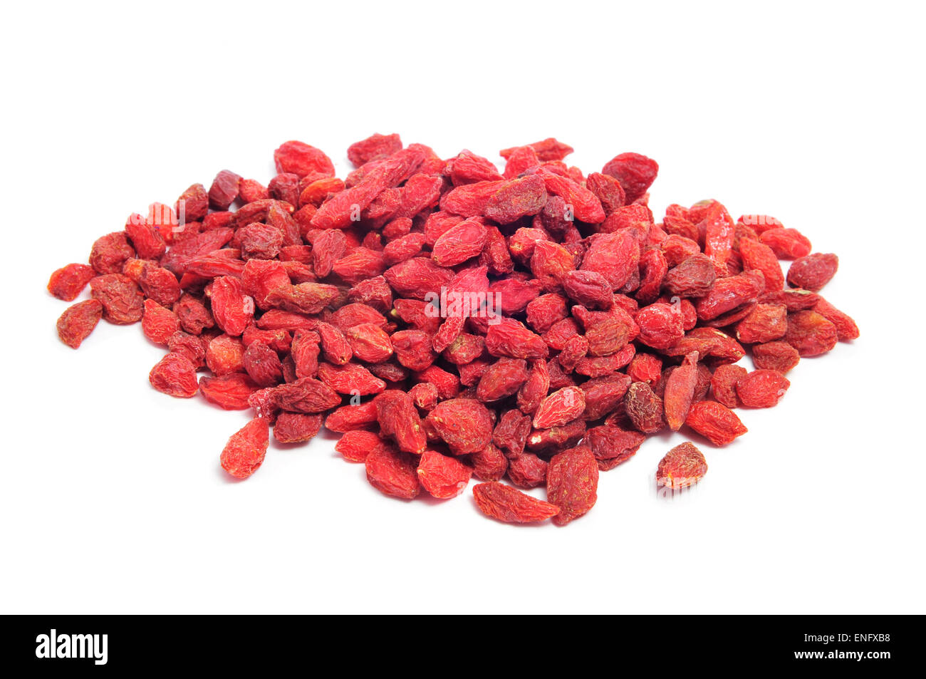 a pile of dried goji berries on a white background Stock Photo
