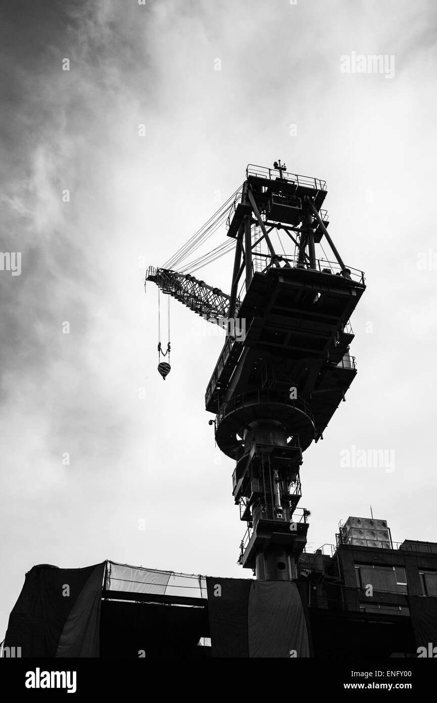 Crane on a new skyscraper in Nihonbashi, Tokyo, Japan Stock Photo