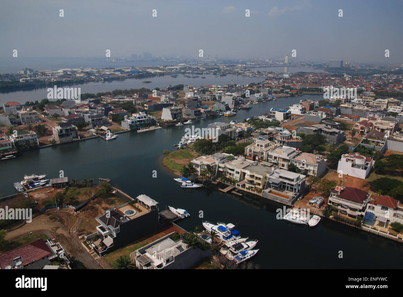 Aerial landscape of Jakarta coastal area, seen from one of the residential towers at Pantai Mutiara in Pluit, Jakarta, Indonesia. Stock Photo