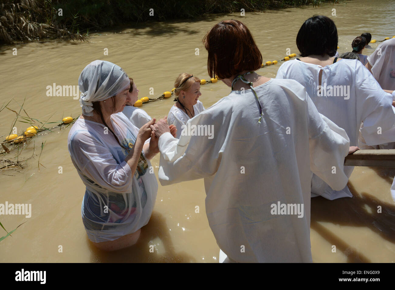 A group of Russian pilgrims at the site of Jesus baptism, on the banks of the Jordan River, Israel. (Photo by Laura Chiesa / Pacific Press) Stock Photo