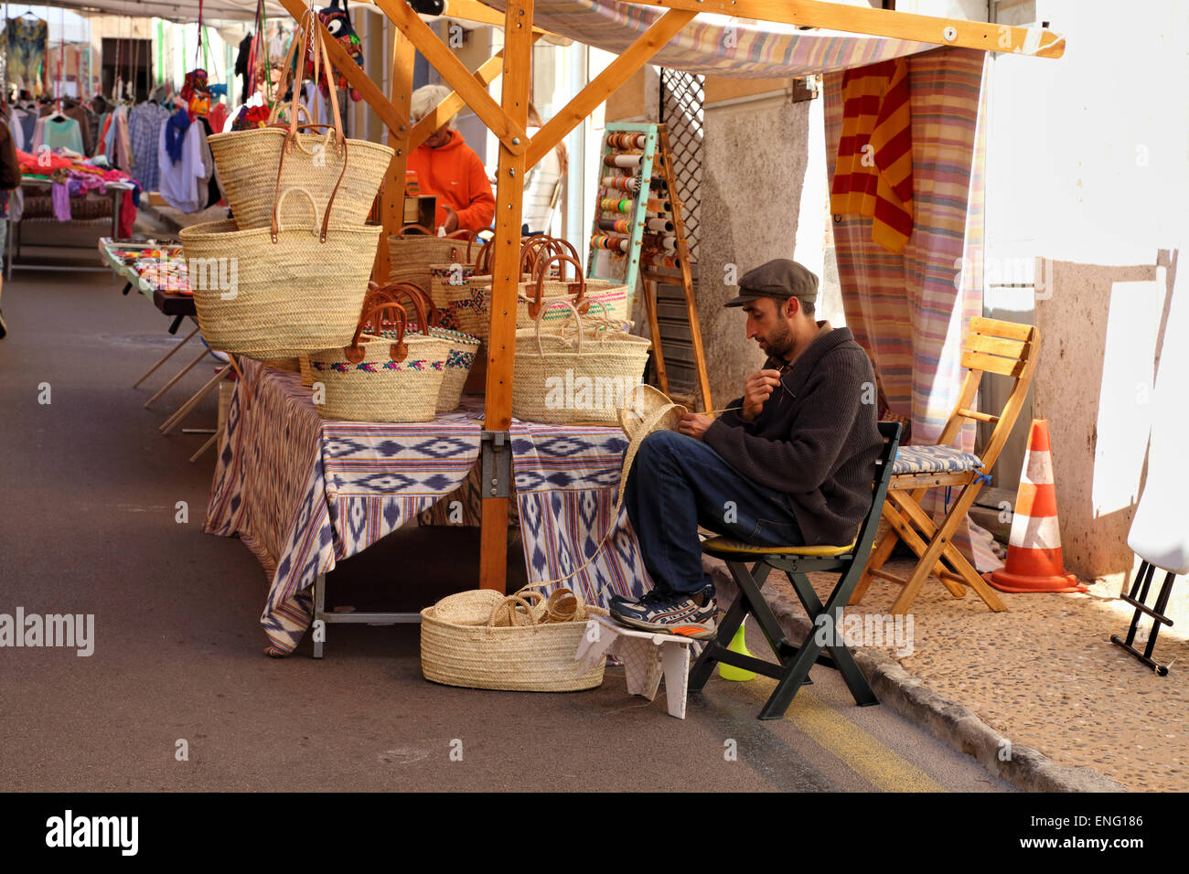 Craft of basket making from palm leaves (Obra de llatra) at a handicrafts street market in Capdepera, Mallorca, Spain Stock Photo