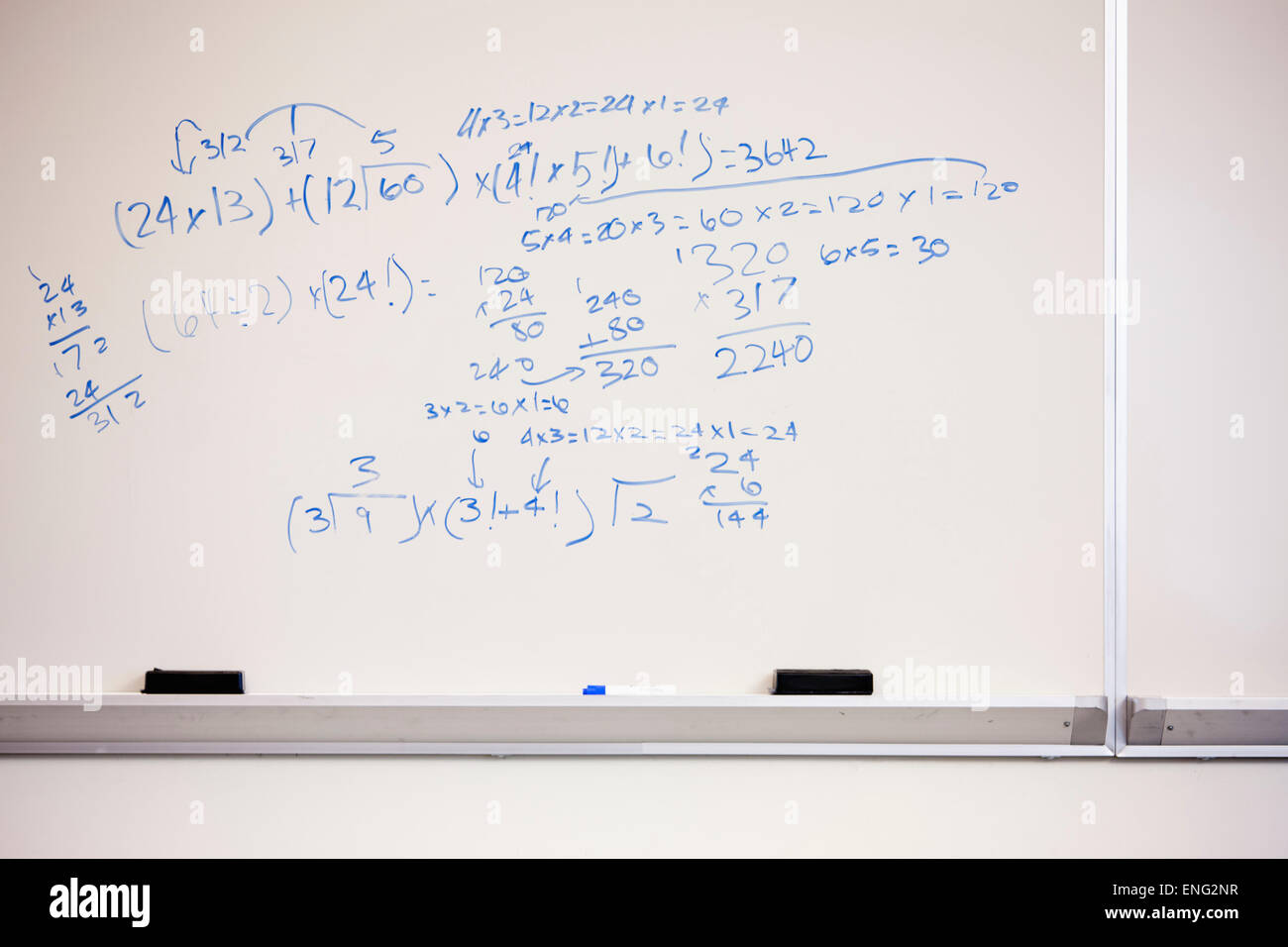 Math equations on whiteboard Stock Photo