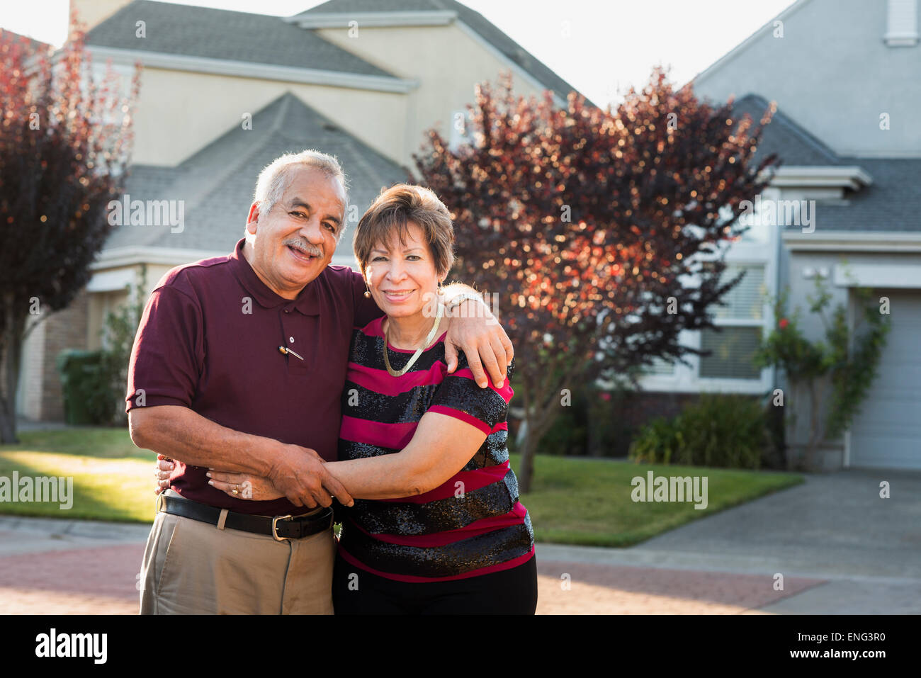 Hispanic senior couple outside house hi-res stock photography and ...