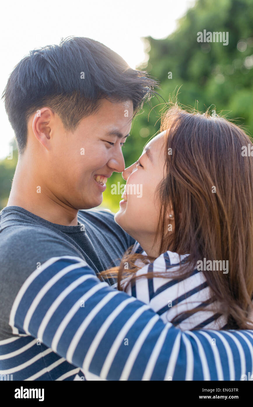 Married young couple hugging in hi-res stock photography and images - Alamy