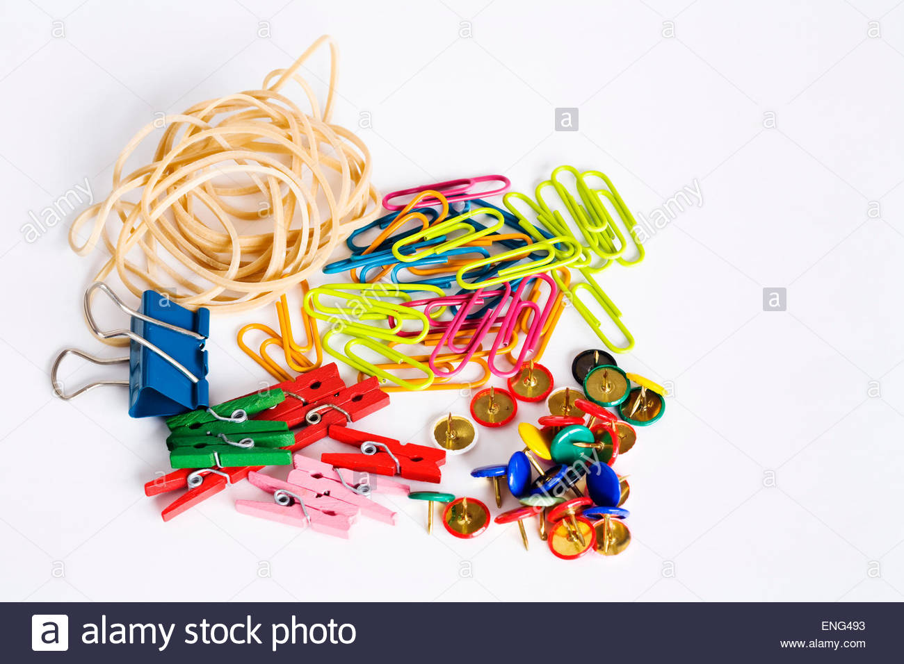 Elastic bands, bulldog clip, paper clips and drawing pins ...